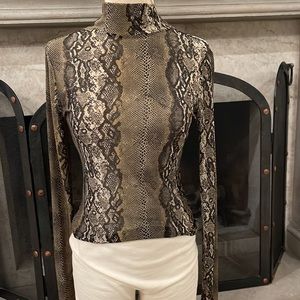 Snake patterned turtle neck